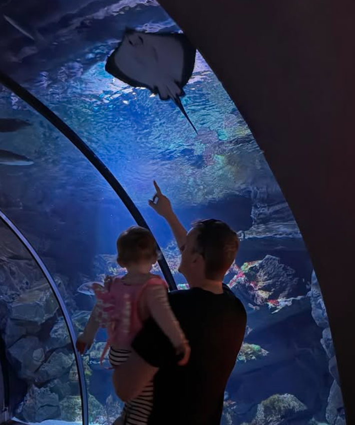 Mike with his daughter at the aquarium
